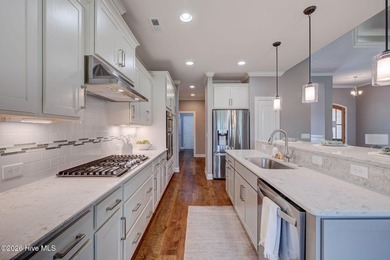 Built in 2020, this stunning 3,056 sq ft all-brick residence on Compass Pointe Golf Course in North Carolina - for sale on GolfHomes.com, golf home, golf lot