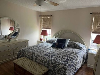 Step Inside This Exceptional Home: Your Dream Awaits!    Homes on Four Lakes Golf Club in Florida - for sale on GolfHomes.com, golf home, golf lot