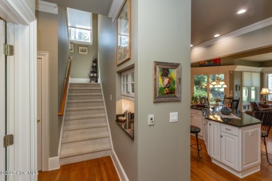 Experience elegant living in this stunning golf front home on Pinewild Country Club of Pinehurst in North Carolina - for sale on GolfHomes.com, golf home, golf lot