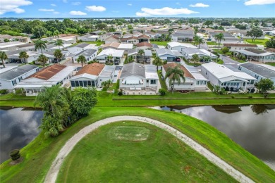 Step inside and feel at home instantly in this beautifully on Lily Lake Golf and RV Resort in Florida - for sale on GolfHomes.com, golf home, golf lot