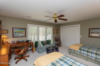 Experience elegant living in this stunning golf front home on Pinewild Country Club of Pinehurst in North Carolina - for sale on GolfHomes.com, golf home, golf lot