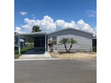 Welcome to this well built Palm Harbor 3/2 nestled on one of on Plantation Golf Club in Florida - for sale on GolfHomes.com, golf home, golf lot