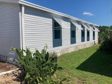 Welcome to this well built Palm Harbor 3/2 nestled on one of on Plantation Golf Club in Florida - for sale on GolfHomes.com, golf home, golf lot