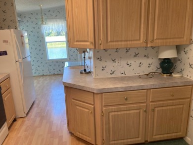 Welcome to this well built Palm Harbor 3/2 nestled on one of on Plantation Golf Club in Florida - for sale on GolfHomes.com, golf home, golf lot