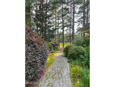 Experience elegant living in this stunning golf front home on Pinewild Country Club of Pinehurst in North Carolina - for sale on GolfHomes.com, golf home, golf lot