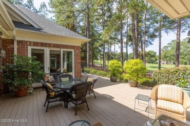 Experience elegant living in this stunning golf front home on Pinewild Country Club of Pinehurst in North Carolina - for sale on GolfHomes.com, golf home, golf lot