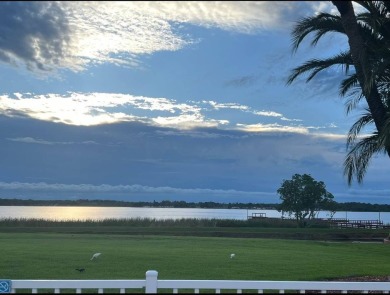 Step Inside This Exceptional Home: Your Dream Awaits!    Homes on Four Lakes Golf Club in Florida - for sale on GolfHomes.com, golf home, golf lot