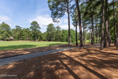 Experience elegant living in this stunning golf front home on Pinewild Country Club of Pinehurst in North Carolina - for sale on GolfHomes.com, golf home, golf lot