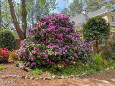 Experience elegant living in this stunning golf front home on Pinewild Country Club of Pinehurst in North Carolina - for sale on GolfHomes.com, golf home, golf lot