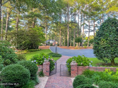 Experience elegant living in this stunning golf front home on Pinewild Country Club of Pinehurst in North Carolina - for sale on GolfHomes.com, golf home, golf lot