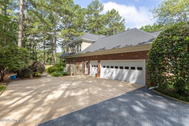 Experience elegant living in this stunning golf front home on Pinewild Country Club of Pinehurst in North Carolina - for sale on GolfHomes.com, golf home, golf lot