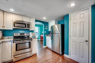 Welcome to this stunning Colonial style home nestled in a quiet on Myrtlewood Golf Course and Club  in South Carolina - for sale on GolfHomes.com, golf home, golf lot