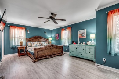 Welcome to this stunning Colonial style home nestled in a quiet on Myrtlewood Golf Course and Club  in South Carolina - for sale on GolfHomes.com, golf home, golf lot