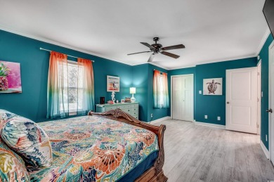 Welcome to this stunning Colonial style home nestled in a quiet on Myrtlewood Golf Course and Club  in South Carolina - for sale on GolfHomes.com, golf home, golf lot