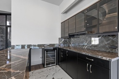 Luxurious one-of-a-kind modern desert masterpiece perched on a on South Shore At Lake Las Vegas in Nevada - for sale on GolfHomes.com, golf home, golf lot