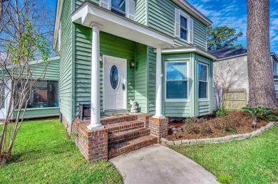 Welcome to this stunning Colonial style home nestled in a quiet on Myrtlewood Golf Course and Club  in South Carolina - for sale on GolfHomes.com, golf home, golf lot