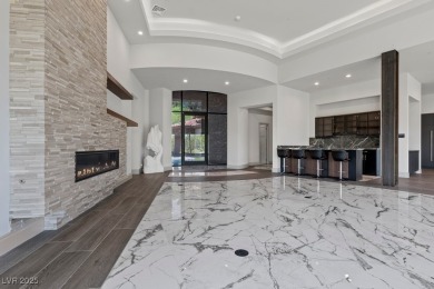 Luxurious one-of-a-kind modern desert masterpiece perched on a on South Shore At Lake Las Vegas in Nevada - for sale on GolfHomes.com, golf home, golf lot