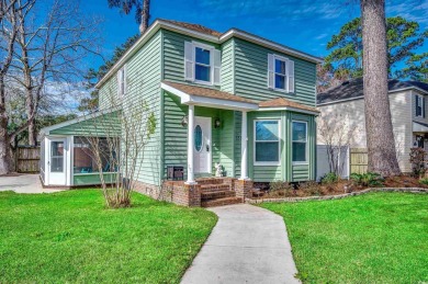 Welcome to this stunning Colonial style home nestled in a quiet on Myrtlewood Golf Course and Club  in South Carolina - for sale on GolfHomes.com, golf home, golf lot