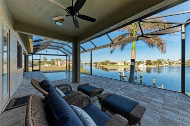 Fall in love with this 2015 built custom waterfront pool home on Saint Andrews South Golf Club in Florida - for sale on GolfHomes.com, golf home, golf lot