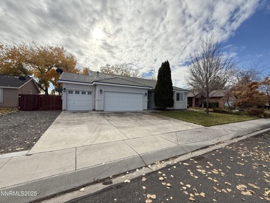 Beautifully maintained 3-bedroom, 2-bath, 1,962 sq ft home with on  in Nevada - for sale on GolfHomes.com, golf home, golf lot
