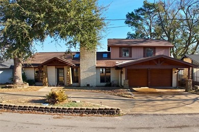 Welcome to your dream waterfront retreat in Cedar Creek Country on Cedar Creek Country Club in Texas - for sale on GolfHomes.com, golf home, golf lot