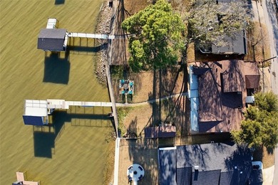 Welcome to your dream waterfront retreat in Cedar Creek Country on Cedar Creek Country Club in Texas - for sale on GolfHomes.com, golf home, golf lot