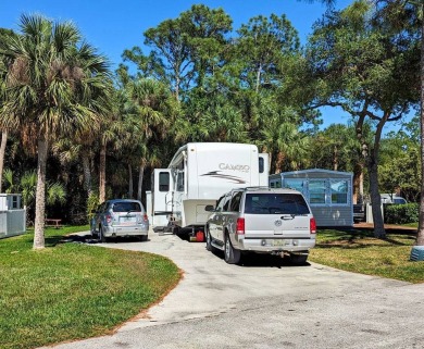This is a great starter RV site with ample room to add an on The Great Outdoors Golf and Country Club in Florida - for sale on GolfHomes.com, golf home, golf lot