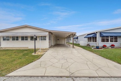 Welcome home to this well-loved, fully furnished 2-bedroom on Lake Henry Golf Club in Florida - for sale on GolfHomes.com, golf home, golf lot