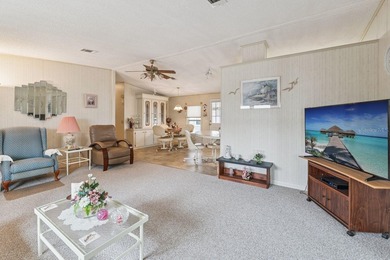 Welcome home to this well-loved, fully furnished 2-bedroom on Lake Henry Golf Club in Florida - for sale on GolfHomes.com, golf home, golf lot