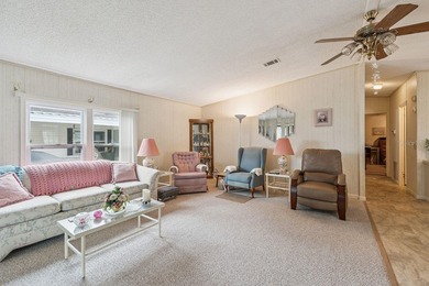 Welcome home to this well-loved, fully furnished 2-bedroom on Lake Henry Golf Club in Florida - for sale on GolfHomes.com, golf home, golf lot