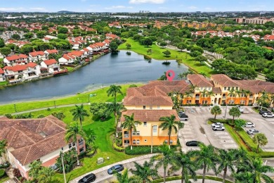 Step into this Mediterranean-inspired gem at Las Sevillas, a on Fontainebleau Golf Course in Florida - for sale on GolfHomes.com, golf home, golf lot