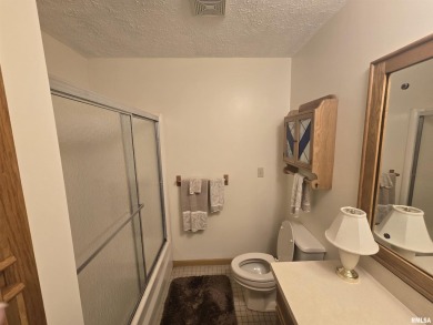 This 3 bedroom, 3 bath home offers a perfect blend of lakefront on Metropolis Country Club in Illinois - for sale on GolfHomes.com, golf home, golf lot