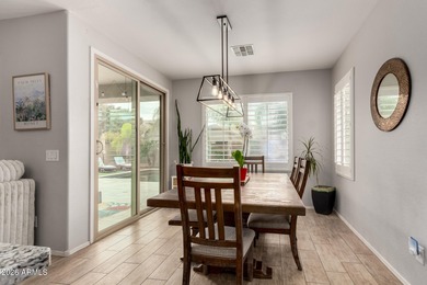 This well-appointed home pairs refined interior finishes with on The Golf Club At Johnson Ranch in Arizona - for sale on GolfHomes.com, golf home, golf lot