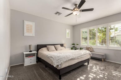 This well-appointed home pairs refined interior finishes with on The Golf Club At Johnson Ranch in Arizona - for sale on GolfHomes.com, golf home, golf lot