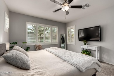 This well-appointed home pairs refined interior finishes with on The Golf Club At Johnson Ranch in Arizona - for sale on GolfHomes.com, golf home, golf lot