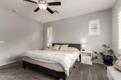 This well-appointed home pairs refined interior finishes with on The Golf Club At Johnson Ranch in Arizona - for sale on GolfHomes.com, golf home, golf lot