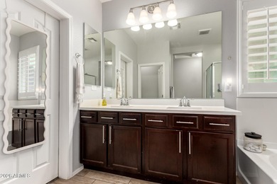 This well-appointed home pairs refined interior finishes with on The Golf Club At Johnson Ranch in Arizona - for sale on GolfHomes.com, golf home, golf lot