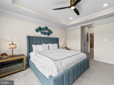 Welcome to 24262 Canoe Drive, an exquisite townhome villa on The Peninsula Golf and Country Club in Delaware - for sale on GolfHomes.com, golf home, golf lot