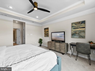 Welcome to 24262 Canoe Drive, an exquisite townhome villa on The Peninsula Golf and Country Club in Delaware - for sale on GolfHomes.com, golf home, golf lot
