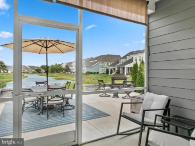 Welcome to 24262 Canoe Drive, an exquisite townhome villa on The Peninsula Golf and Country Club in Delaware - for sale on GolfHomes.com, golf home, golf lot