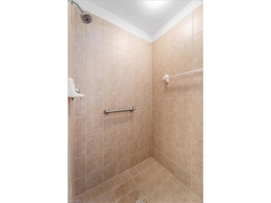 Set in one of Naples' most desirable gated communities, this on Quail Village Golf Course in Florida - for sale on GolfHomes.com, golf home, golf lot