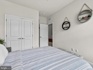 Welcome to 24262 Canoe Drive, an exquisite townhome villa on The Peninsula Golf and Country Club in Delaware - for sale on GolfHomes.com, golf home, golf lot
