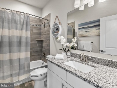 Welcome to 24262 Canoe Drive, an exquisite townhome villa on The Peninsula Golf and Country Club in Delaware - for sale on GolfHomes.com, golf home, golf lot