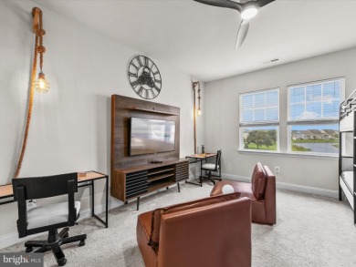 Welcome to 24262 Canoe Drive, an exquisite townhome villa on The Peninsula Golf and Country Club in Delaware - for sale on GolfHomes.com, golf home, golf lot