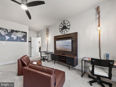 Welcome to 24262 Canoe Drive, an exquisite townhome villa on The Peninsula Golf and Country Club in Delaware - for sale on GolfHomes.com, golf home, golf lot