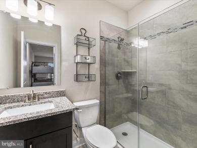 Welcome to 24262 Canoe Drive, an exquisite townhome villa on The Peninsula Golf and Country Club in Delaware - for sale on GolfHomes.com, golf home, golf lot