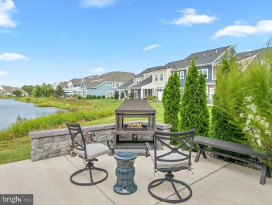 Welcome to 24262 Canoe Drive, an exquisite townhome villa on The Peninsula Golf and Country Club in Delaware - for sale on GolfHomes.com, golf home, golf lot