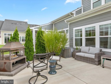 Welcome to 24262 Canoe Drive, an exquisite townhome villa on The Peninsula Golf and Country Club in Delaware - for sale on GolfHomes.com, golf home, golf lot