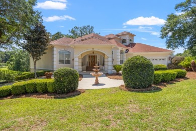 This stunning 2 story home sits on a beautiful landscaped corner on The Golf Club At Summerbrooke in Florida - for sale on GolfHomes.com, golf home, golf lot