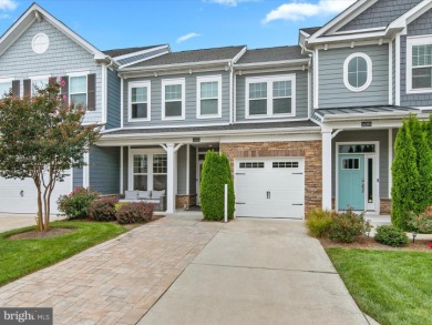 Welcome to 24262 Canoe Drive, an exquisite townhome villa on The Peninsula Golf and Country Club in Delaware - for sale on GolfHomes.com, golf home, golf lot